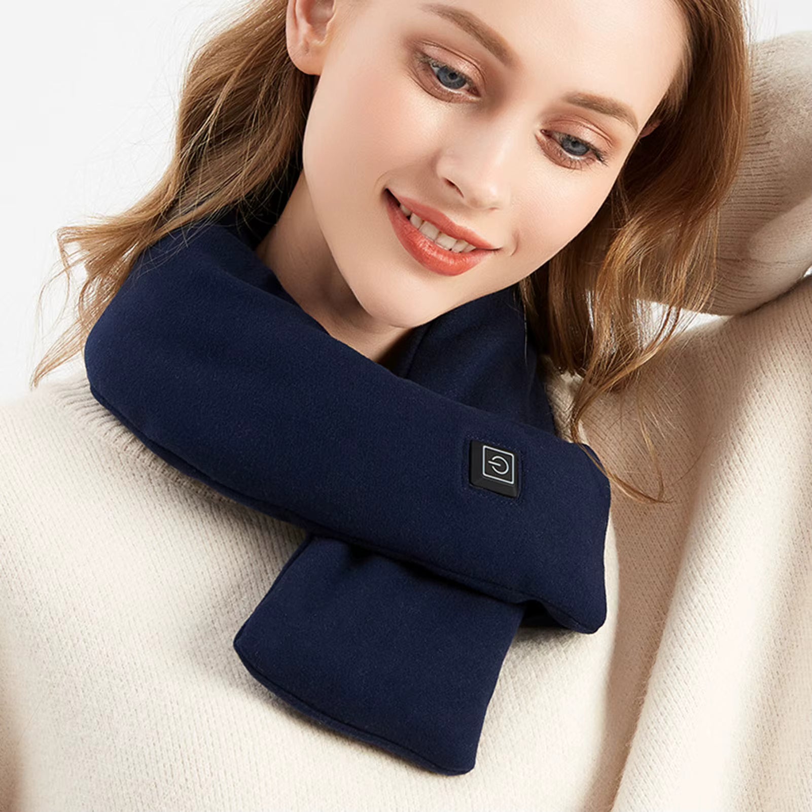 Ultra soft skin-friendly heated scarf with integrated USB power button.